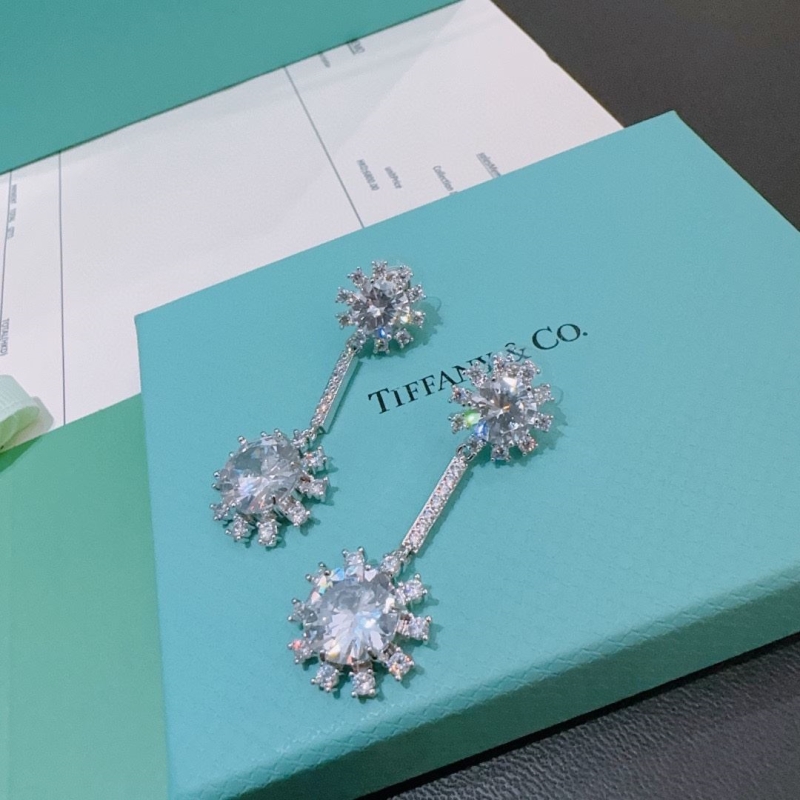T*f*ny earrings